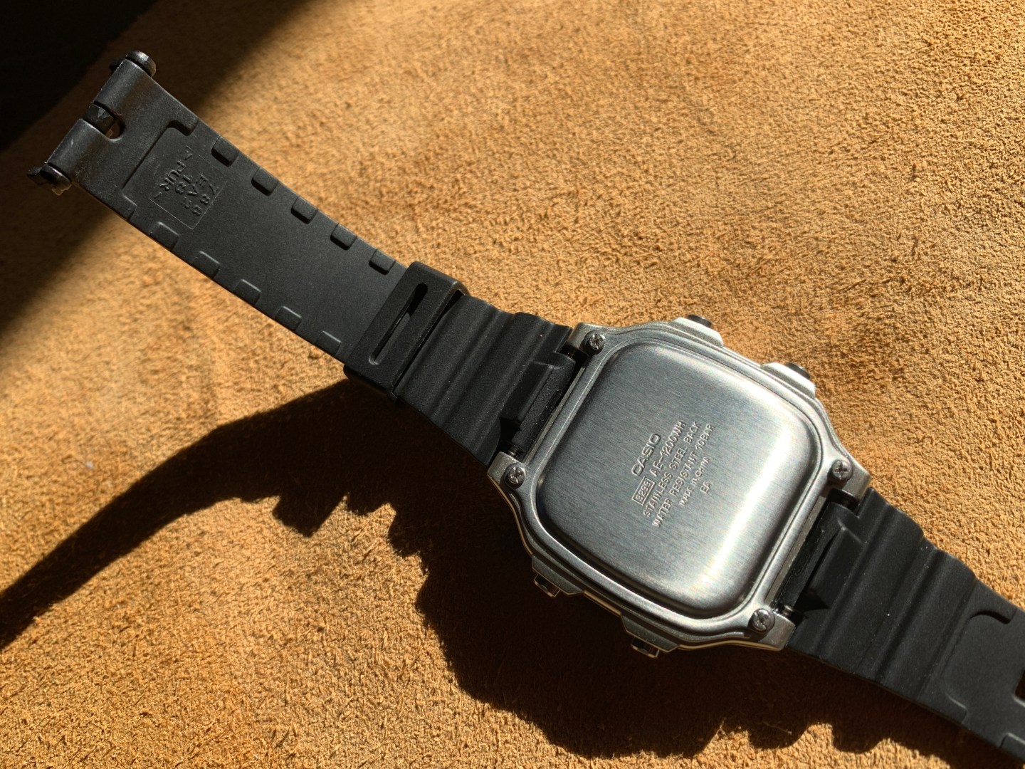 Casio AE1200 World Timer case back and strap